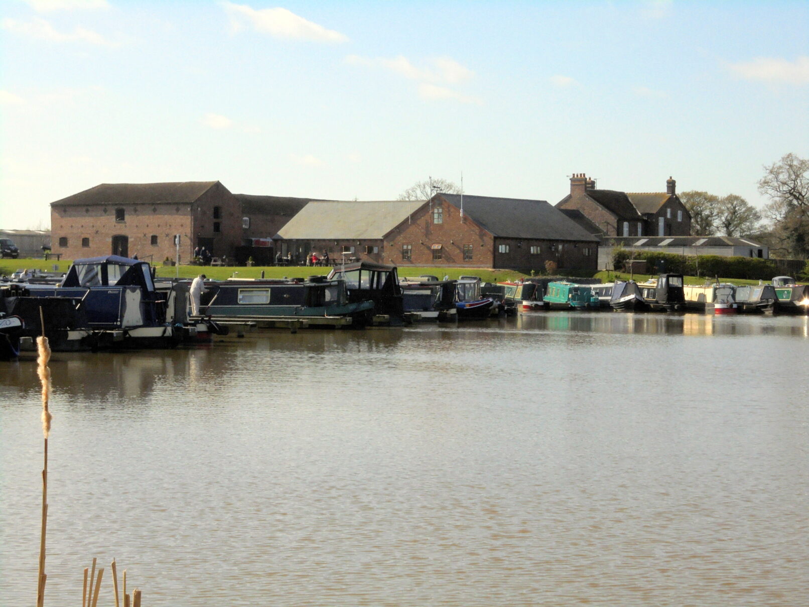 Existing barns, admin building and farmhouse behind
